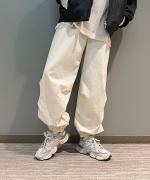 高密度60/1サテン近江晒パラシュートパンツ